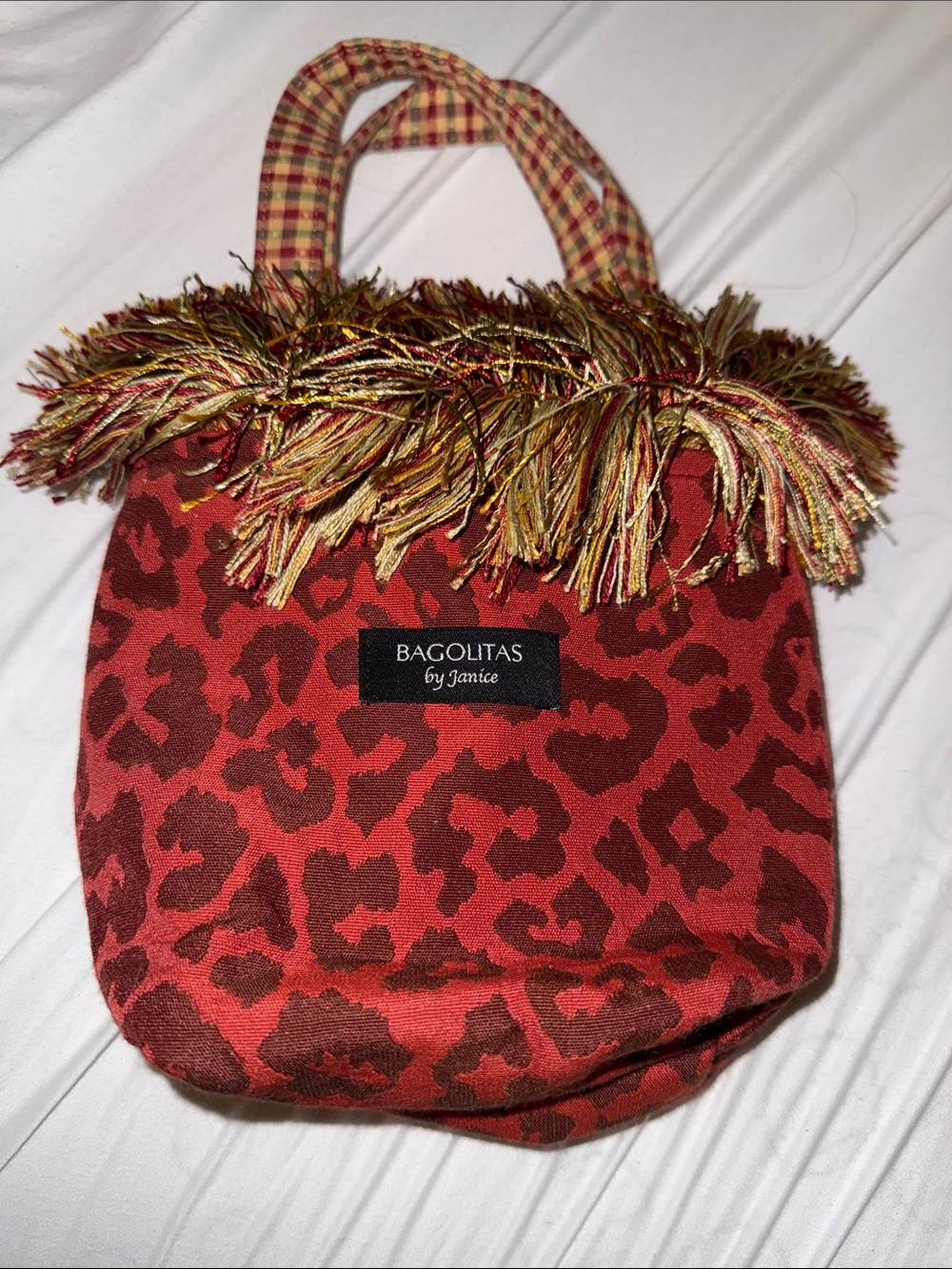 New without tags beautiful Bagolitas by Janice. Leopard print with fringe purse.